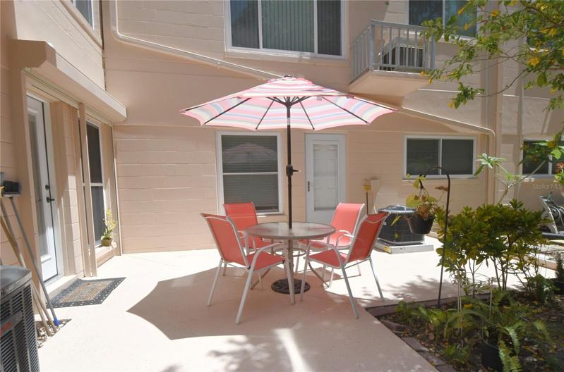 Back porch - outdoor area. It is shared with a neighbor.