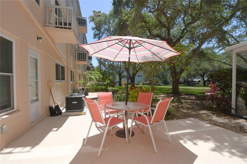 Back porch - outdoor area. It is shared with a neighbor.
