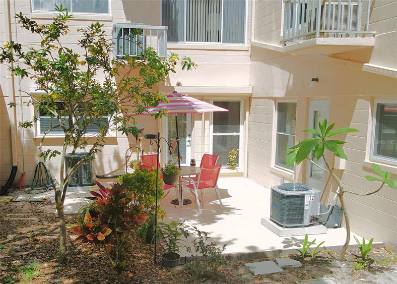 Back porch - outdoor area. It is shared with a neighbor.