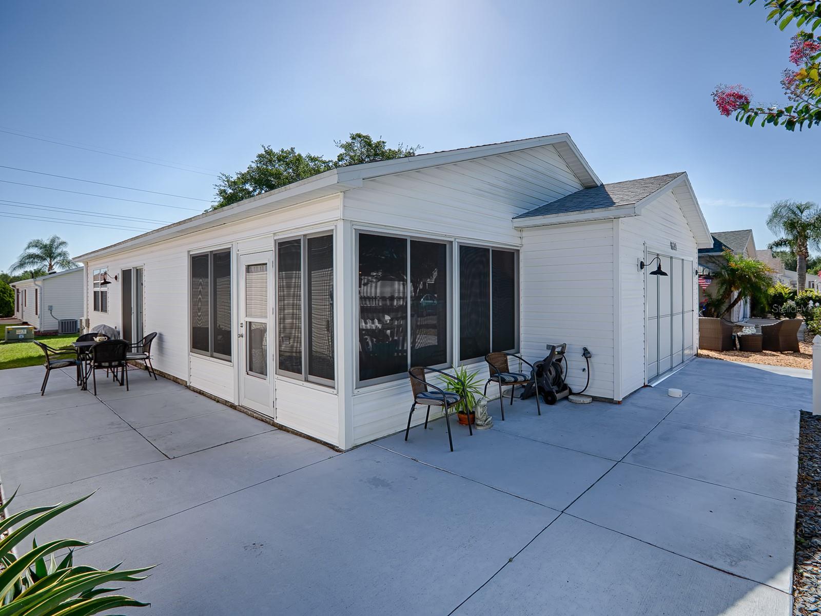 SPACIOUS WRAP-AROUND PATIO...PERFECT FOR A NEIGHBORLY VISIT OR SOME OUTDOOR GRILLING!