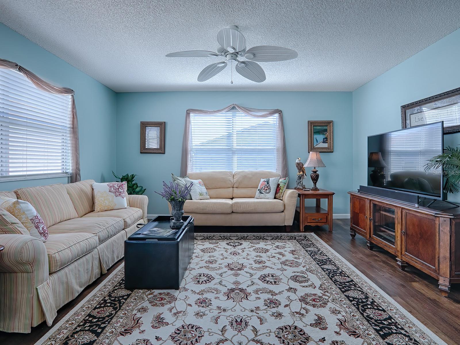 THE SPACIOUS GREAT ROOM HAS PLENTY OF ROOM FOR ALL!