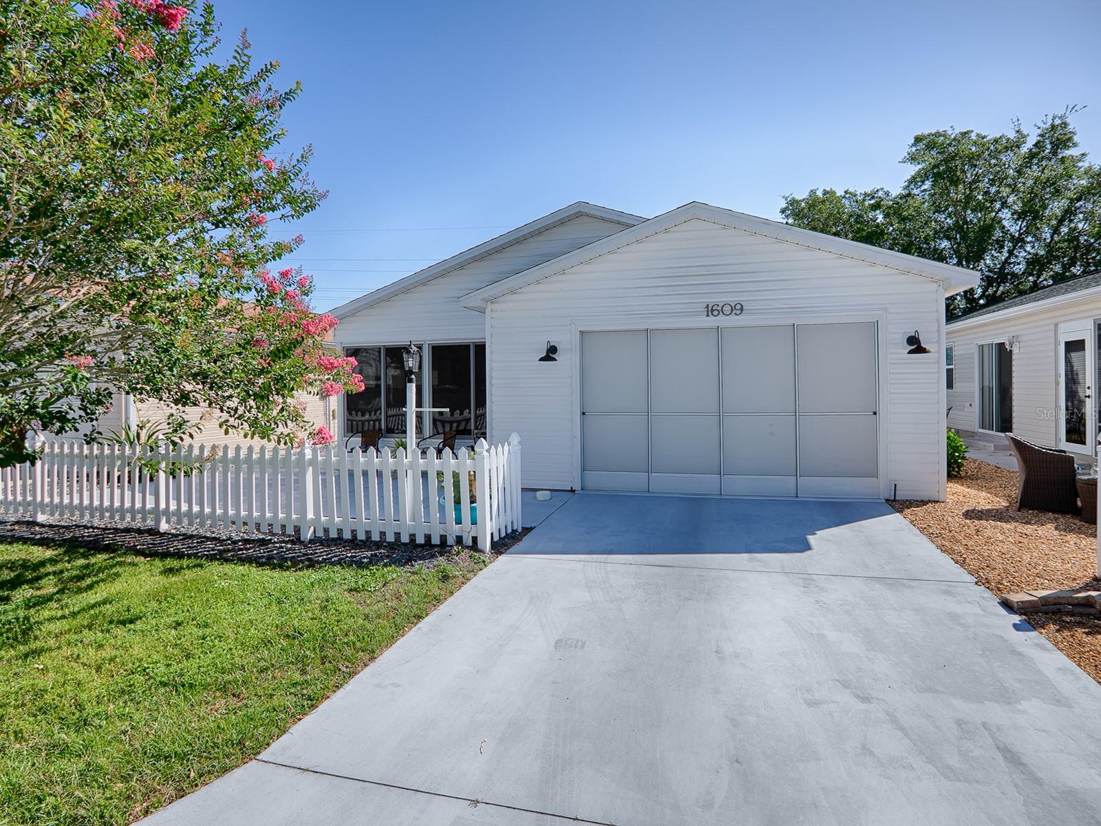 GARAGE HAS ROOM FOR A GOLF CART