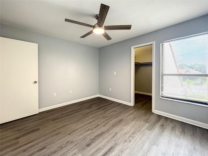second bedroom with walk in closet