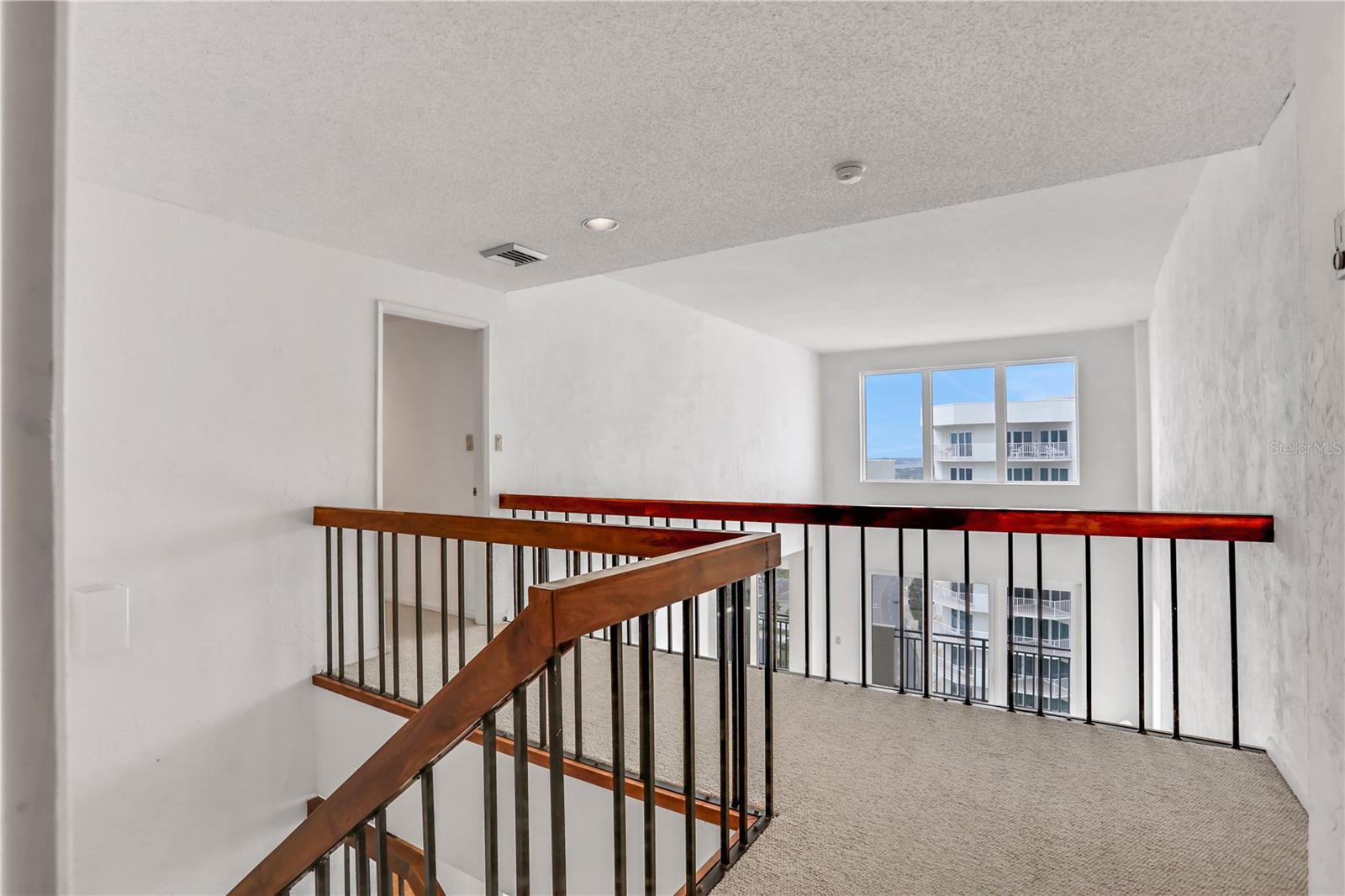 Upstairs to the landing. Would make a nice office space.