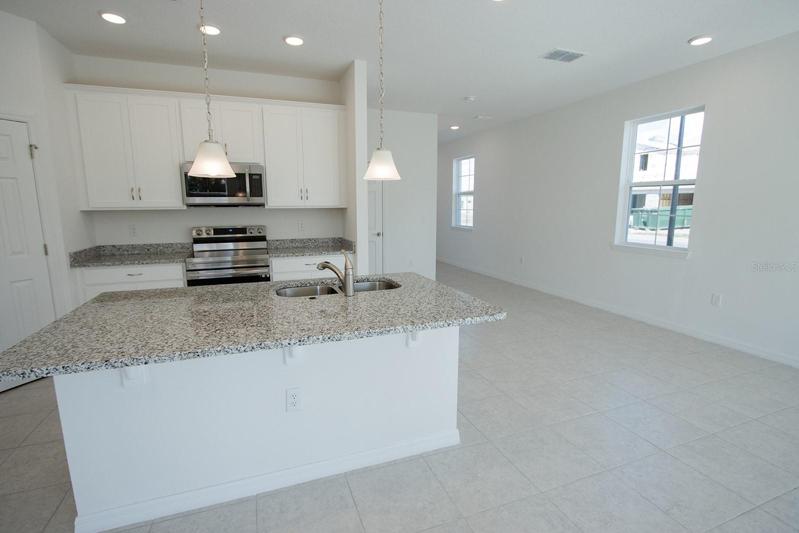 Interior photos are of different home, same model.  This home has similar finishings.