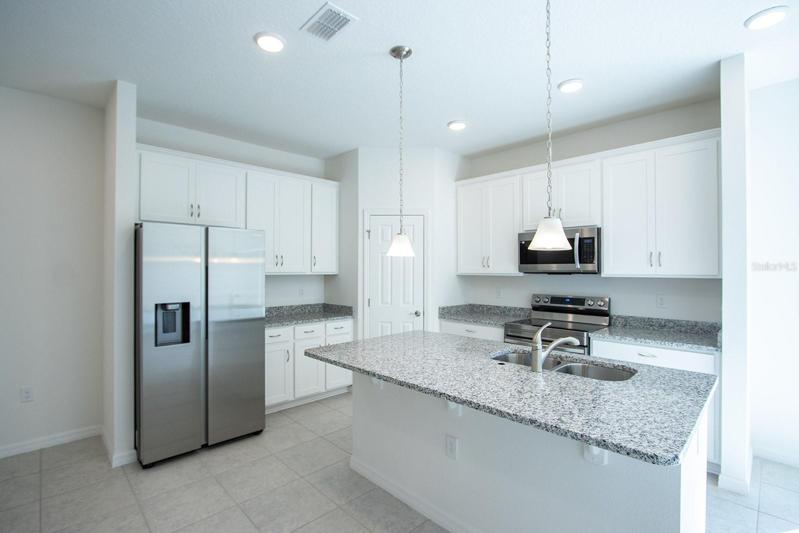 Interior photos are of same floor plan, different home.  This home has similar finishings.