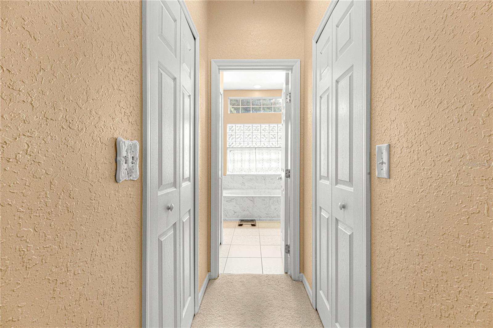 primary bedroom has two large walk in closet. 1) has California closet with pull out mirror &amp; pull out hamper for your convenience.