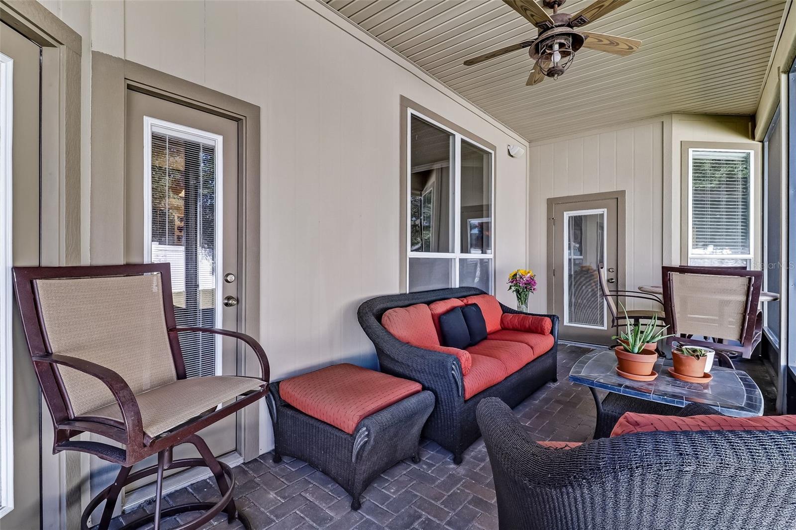 Screened Lanai w/ceiling fan, brick floor &amp; shiplap ceiling
