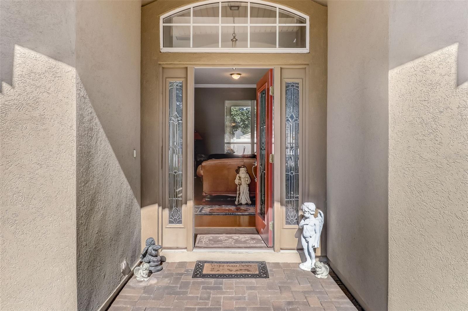 Covered Front Porch looking into Foyer