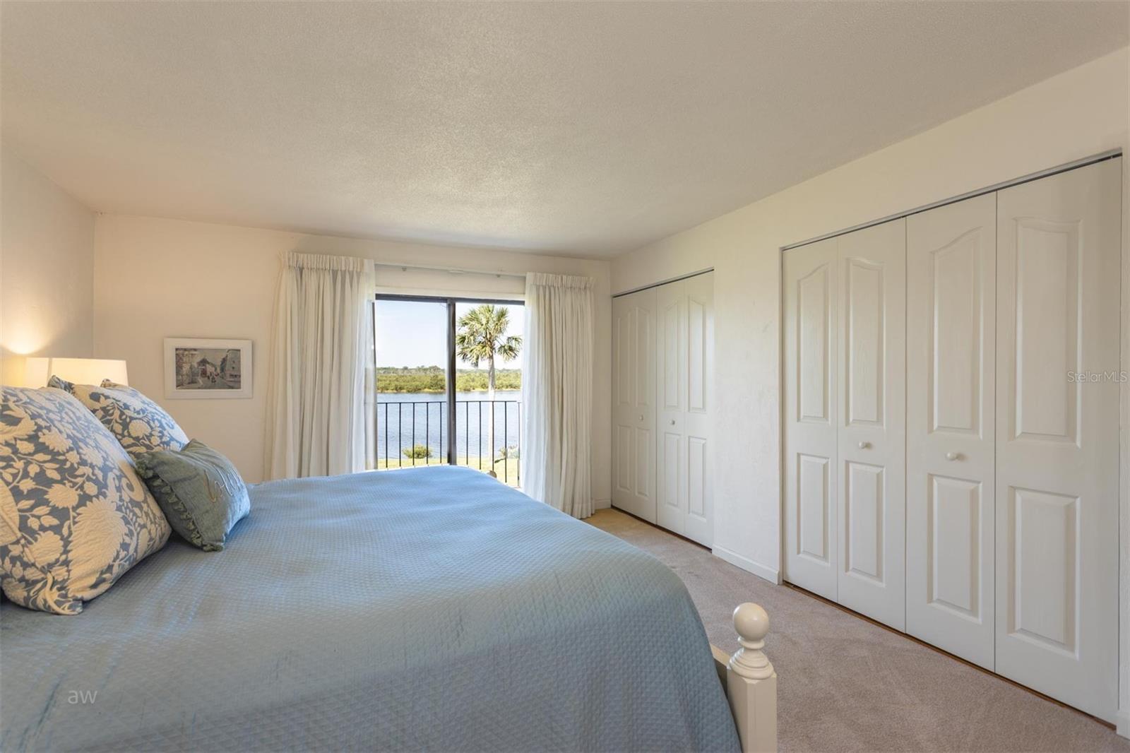 The master suite offers a serene retreat with its own private balcony