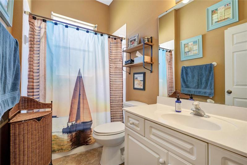 Bath 2 located between bedrooms 2 and 3 and at the bottom of the stair well to the bonus room.