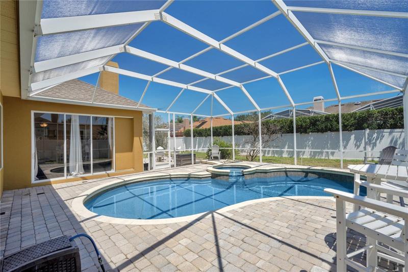 Pebble Tec finished screened pool and spa
