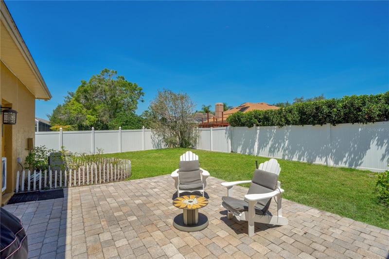 Open air brick paver sunning deck.