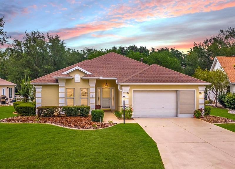 FRONT EXTERIOR @ DUSK - 2105 Barbosa Court, VILLAGE of SANTO DOMINGO