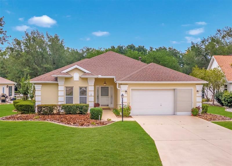 FRONT EXTERIOR - 2105 Barbosa Court is a MARABELLE Designer with 3 BR/2 BA/ 2 CAR Garage