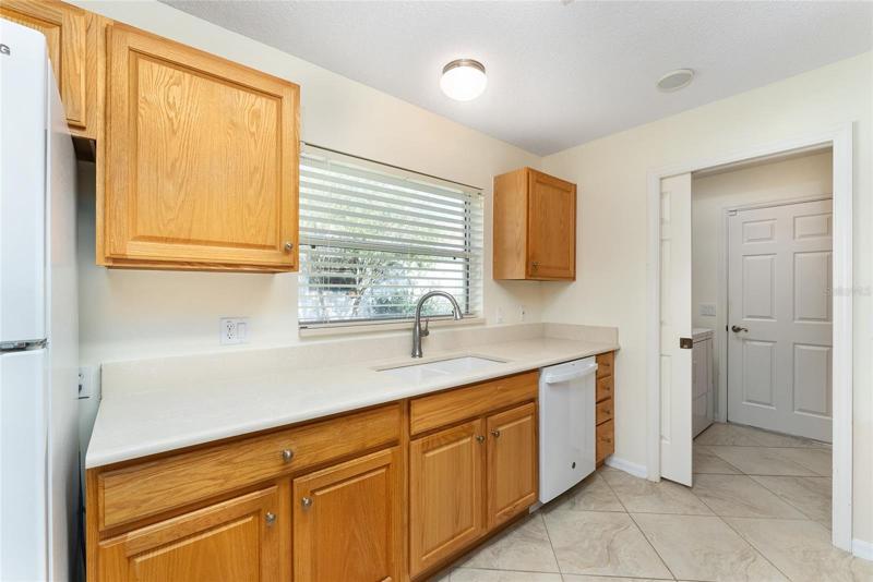 KITCHEN has plenty of NATURAL LIGHT from window above sink