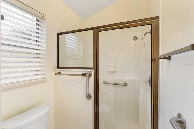 ENSUITE MASTER BATHROOM w/ POCKET DOOR allows privacy while in WATER CLOSET or WALK-IN SHOWER