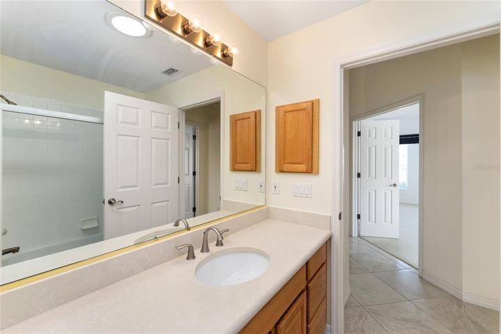 View from inside of BATHROOM #2 looking into front hallway.