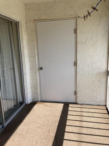 Storage closet on porch.