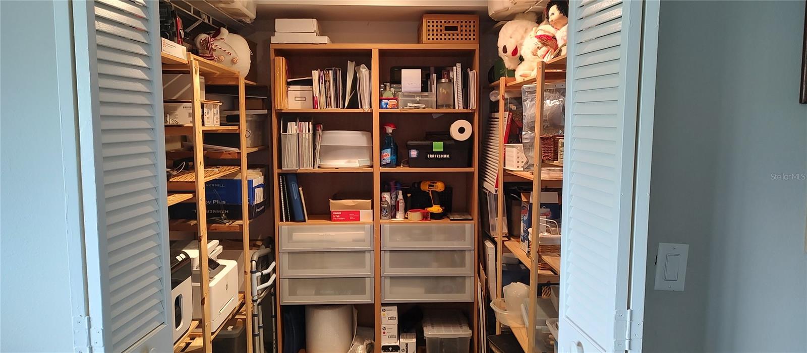 Large walk-in used as office storage!