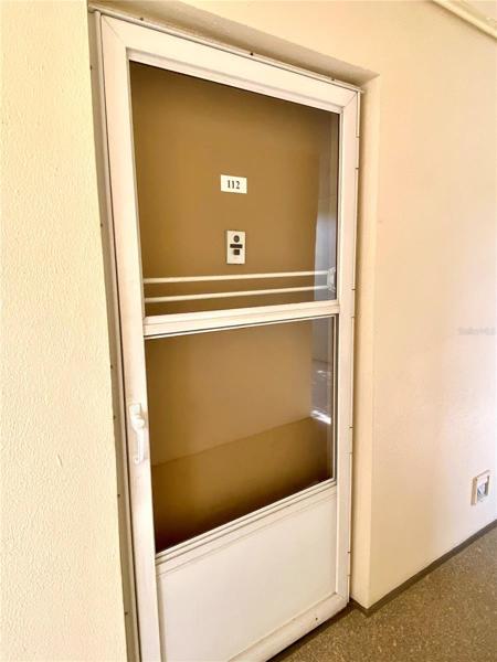 Front door to unit 112