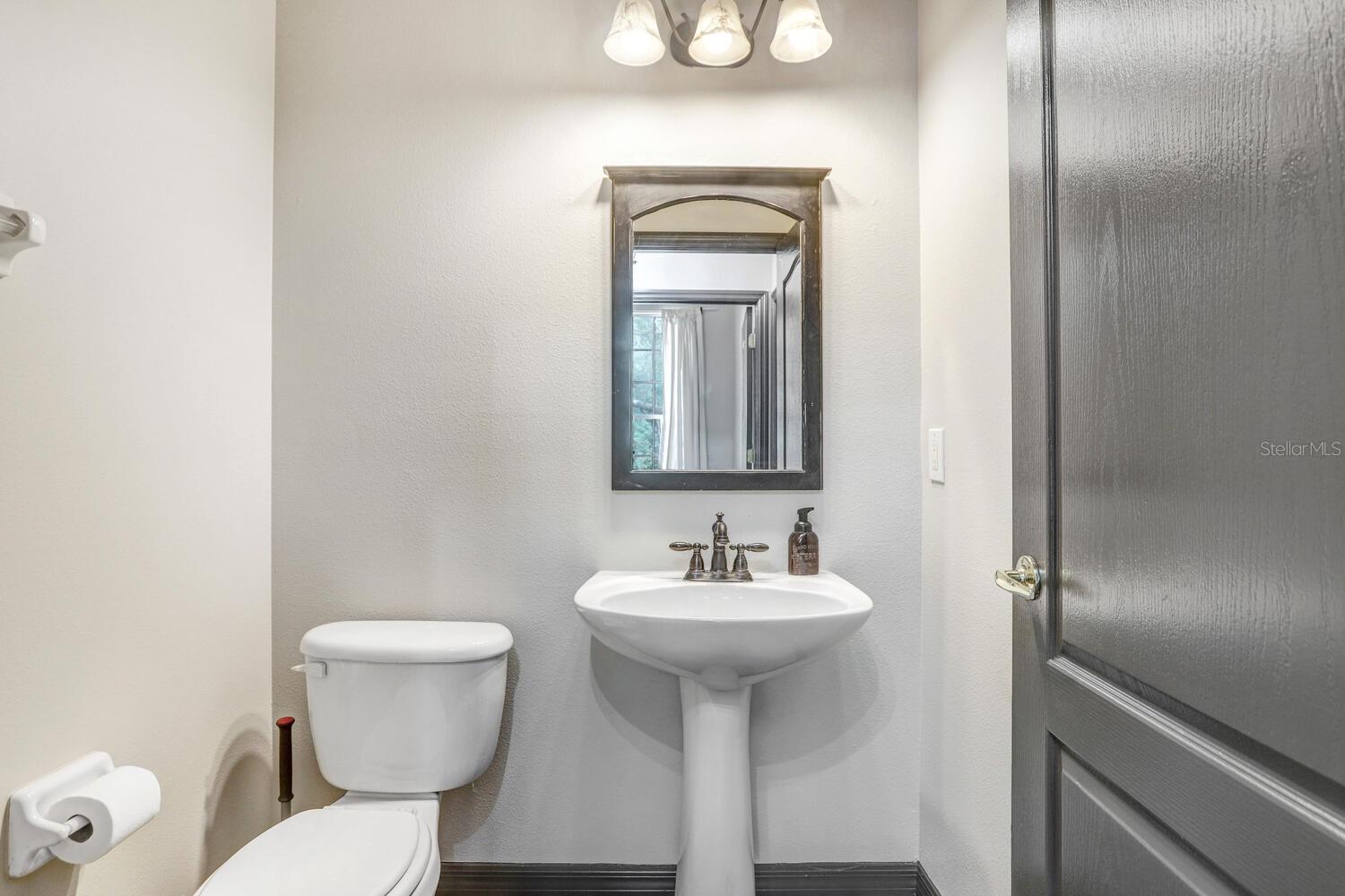 Half Bath downstairs at Entryway