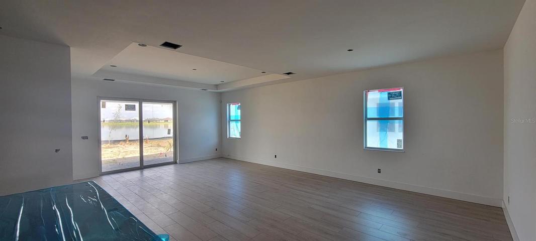 Great room with tray ceiling