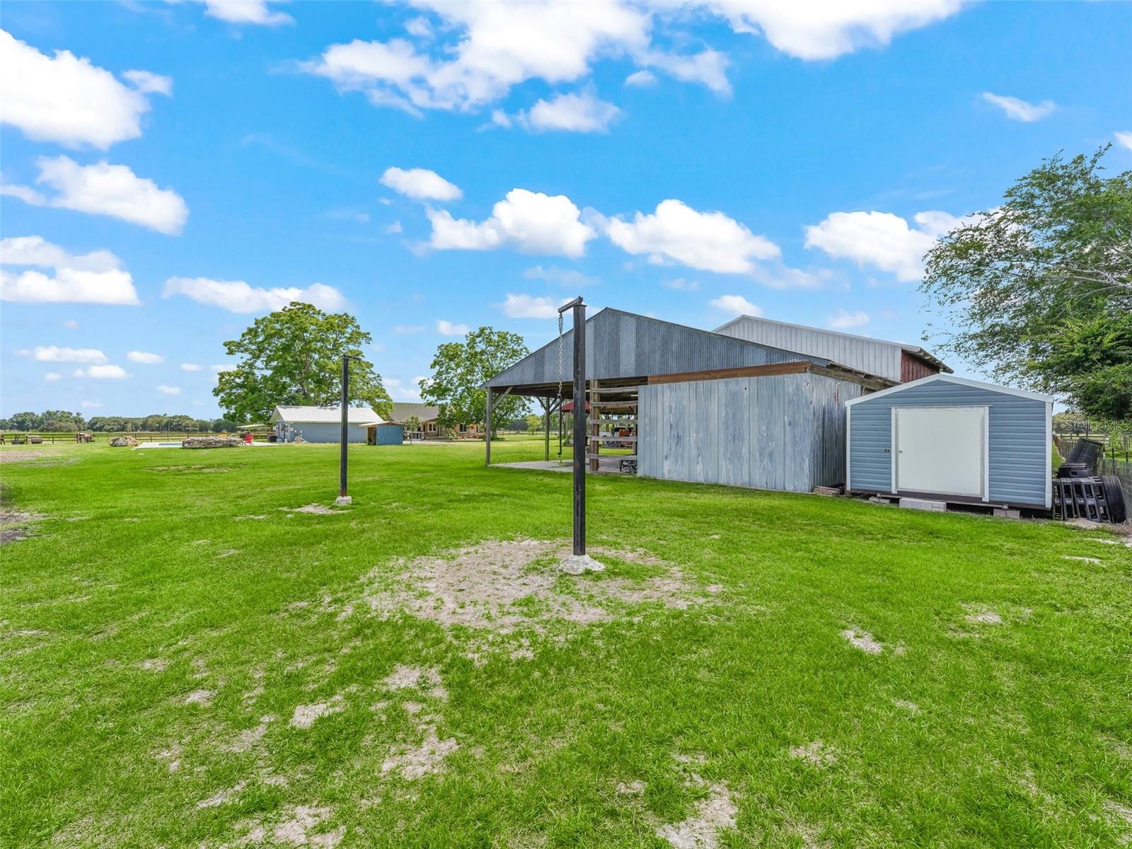 Rear of main barn and new storage shed