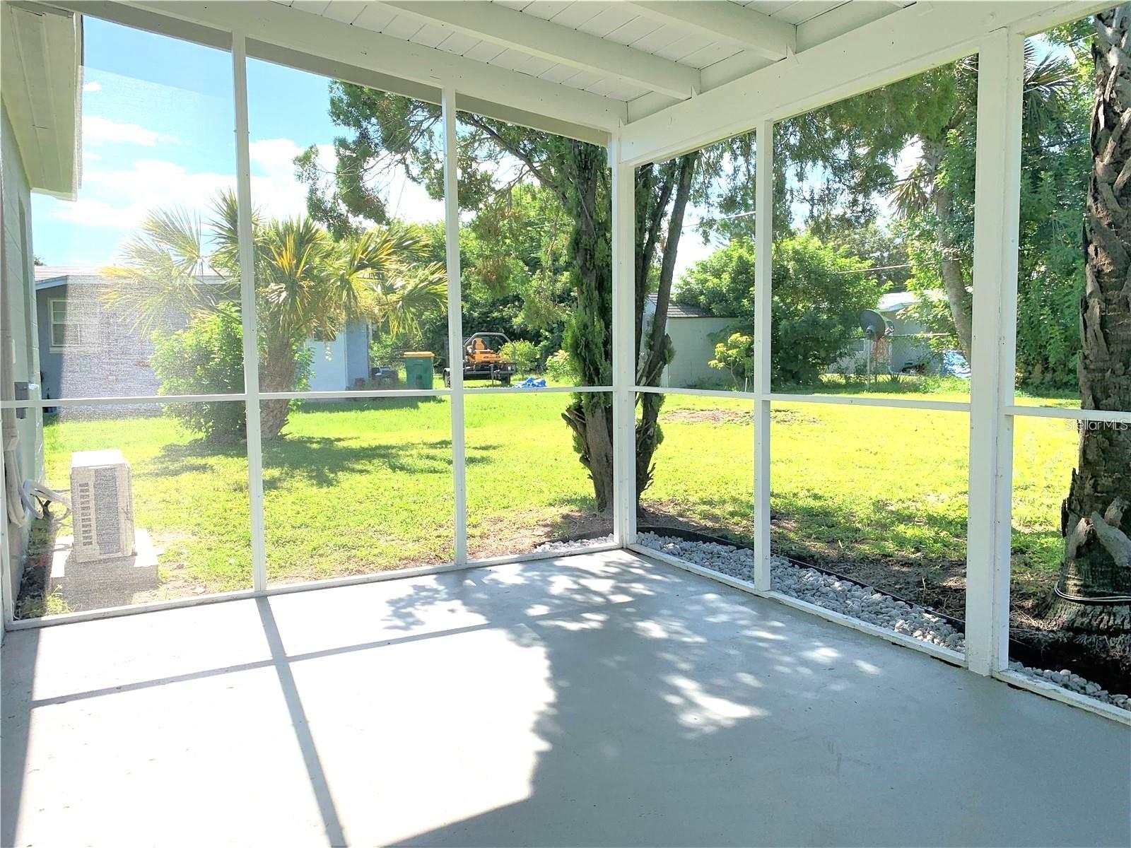 Screened back porch area