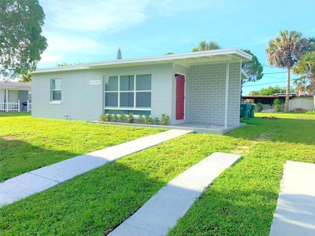 Welcome Home! Freshly painted exterior and newly landscaped front. Brand new roof and impact windows!