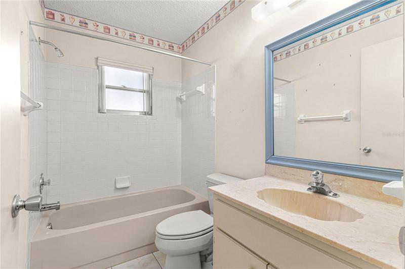 Guest Bath with Ceramic Tile Surround Tub