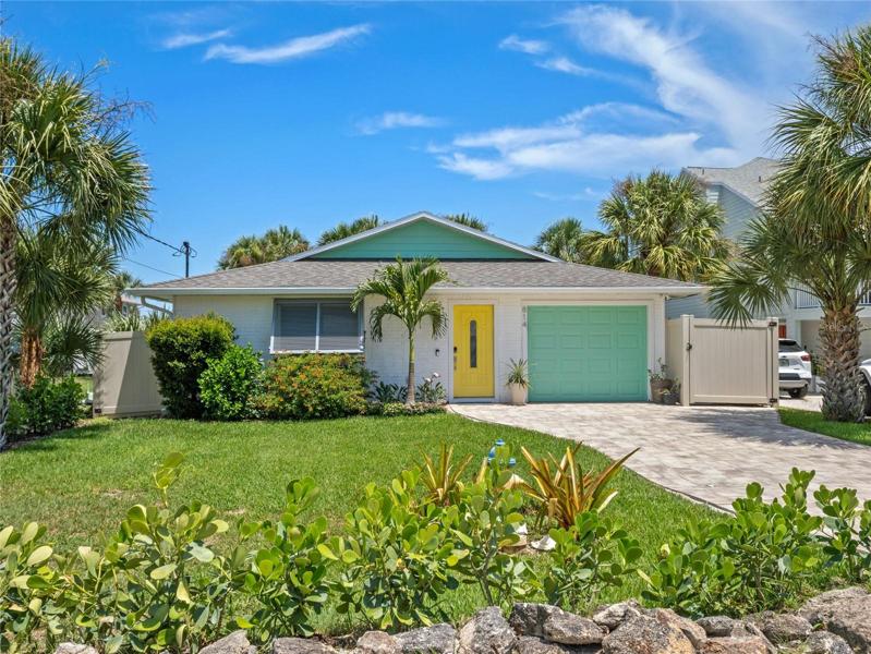 Beautifully updated home in New Smyrna Beach with direct beach walkover.