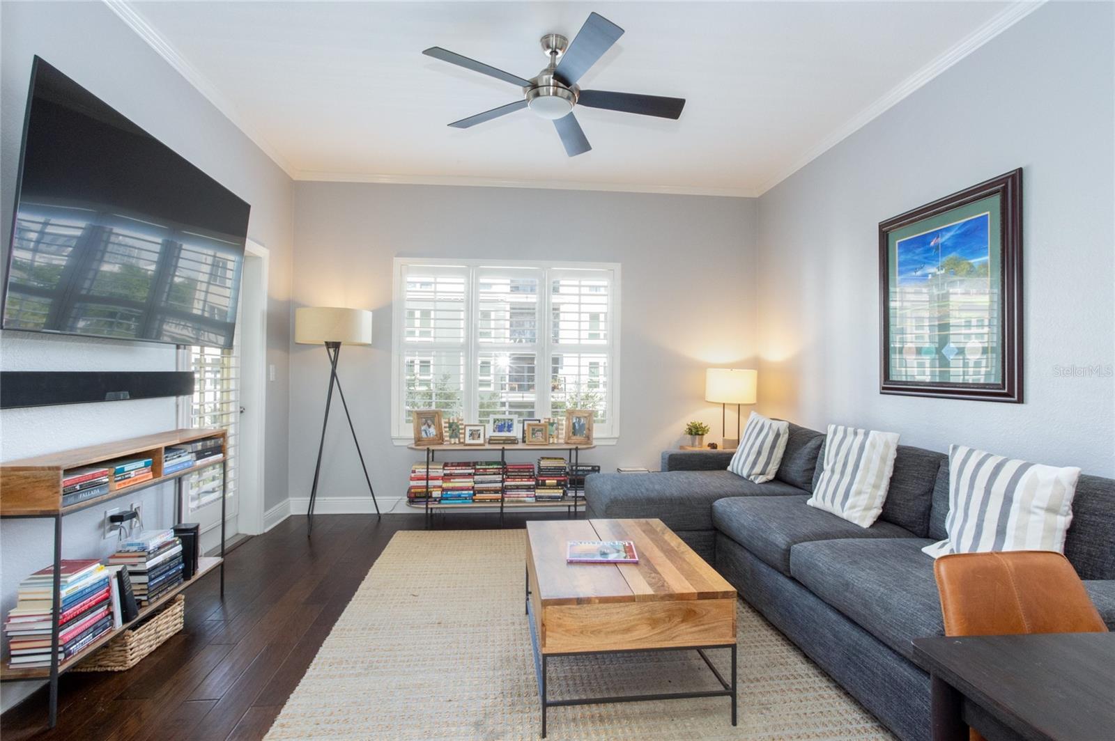Living room with door that leads to balcony