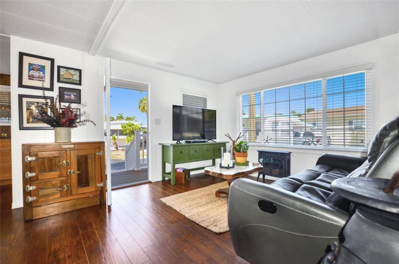 With ample light and hardwood floors, you will feel right at home.