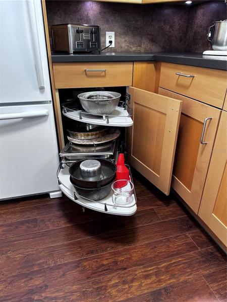 Kitchen has no wasted space, with pull out storage in the cabinets