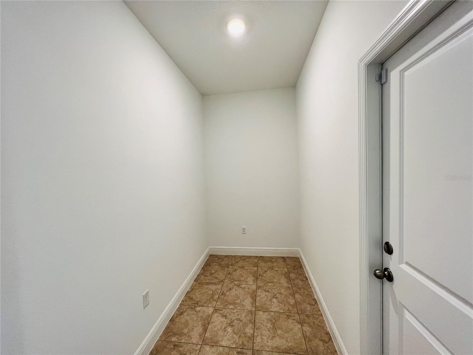 Mudroom. Could be used as small office area.