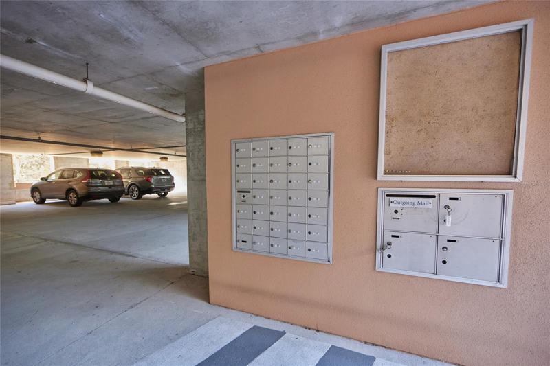 Mailbox center under building located in garage.