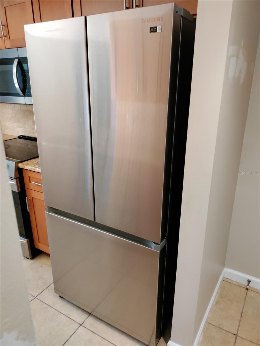Newer stainless refrigerator.