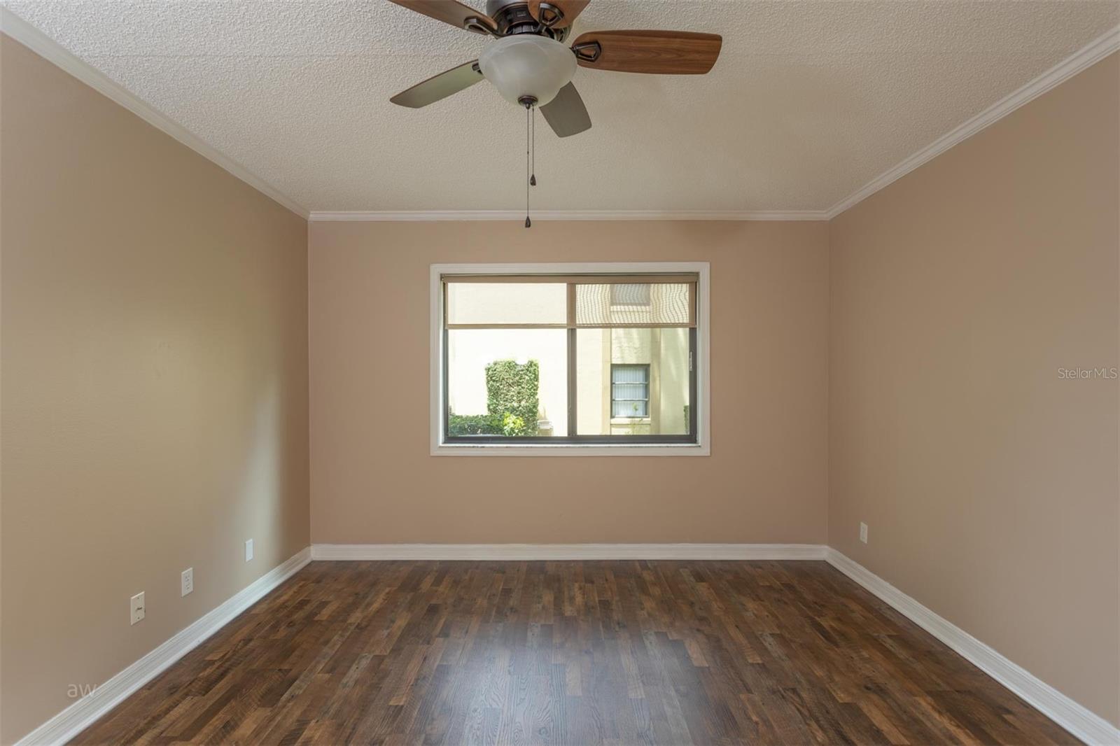 Master Bedroom with high quality vinyl floors.