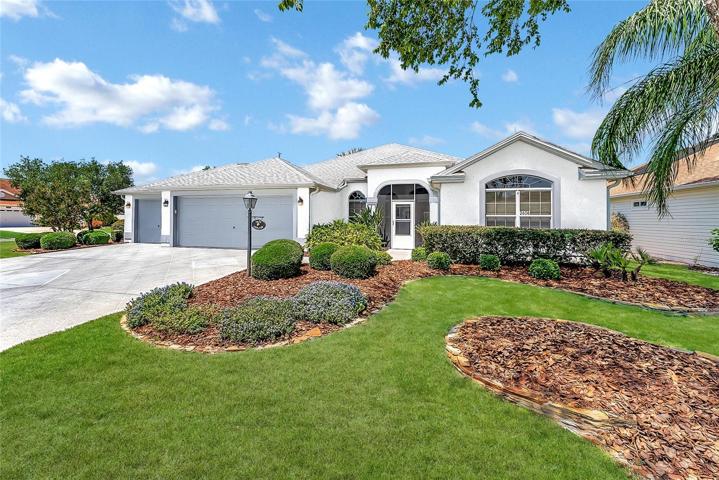 FRONT EXTERIOR - 2026 Havana Trail in the VILLAGE of HADLEY - GARDENIA Designer with 3 BR/2 BA/3 Car Garage and lovely WATER VIEW
