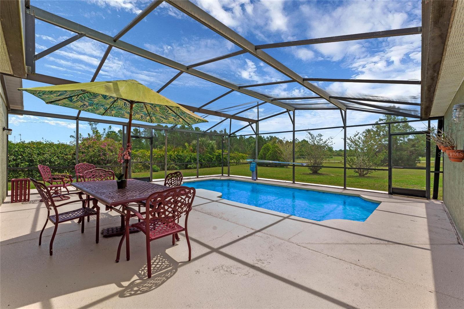 pool view of backyard