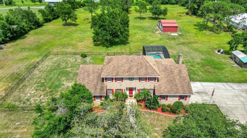 Beautiful pool home on 5 MOL acres
