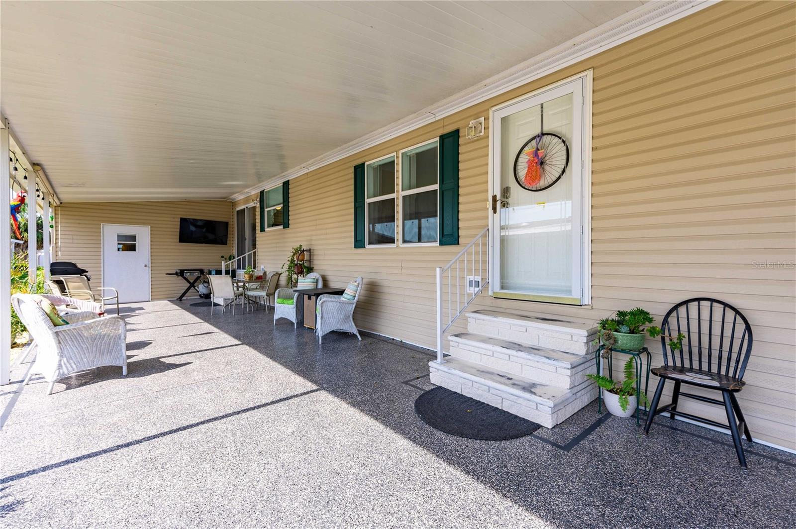Huge carport with painted driveway