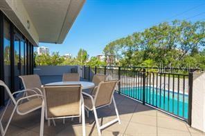 Pool deck overlooking pool