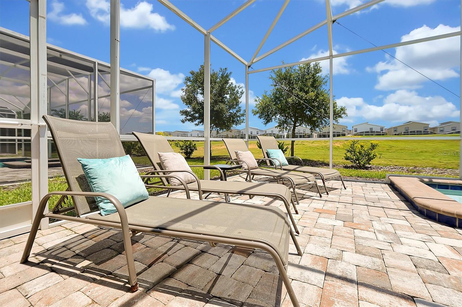 Oversized pool deck for plenty of room to sunbathe