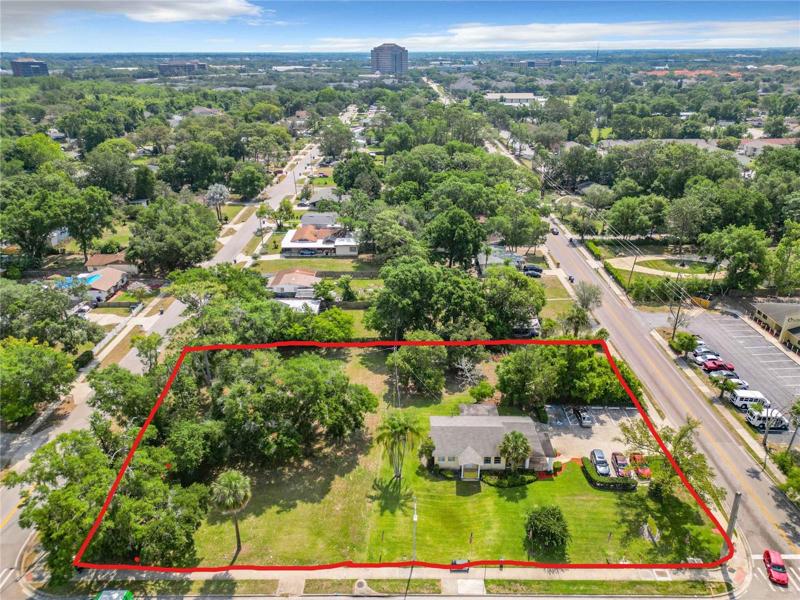 Looking east with Maitland Center buildings in the background. The Property for sale runs from Drake Drive to the next block which is Pembrook Drive.