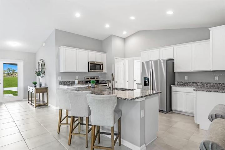 Kitchen *Disclaimer Photos are of Model Home and not Actual Property