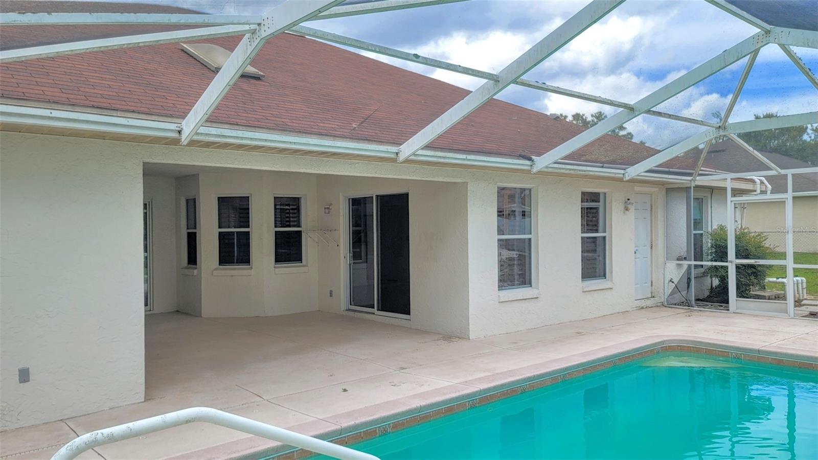 Under roof patio with a skylight