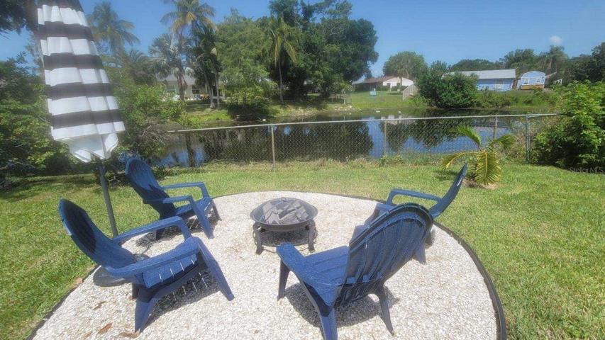 The seller has athoughtfully cleared the brush behind the fence, providing you with an unobstructed and breathtaking view of the serene pond. Don't miss the opportunity to embrace nature's beauty from the comfort of your own backyard!