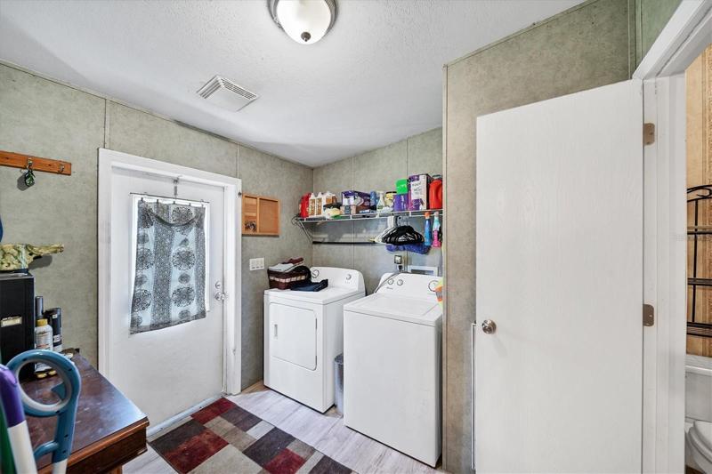 Spacious Laundry Room by back entrance